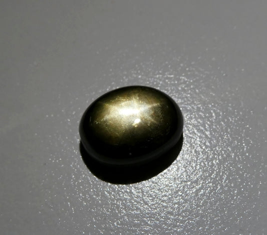 6.95CT UNHEATED OVAL 100% NATURAL 6 RAYS GOLDEN BLACK STAR SAPPHIRE