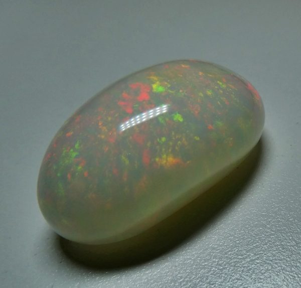 65.65CT UNTREATED JUMBO RAINBOW FLASHING 100% NATURAL CRYSTAL OPAL