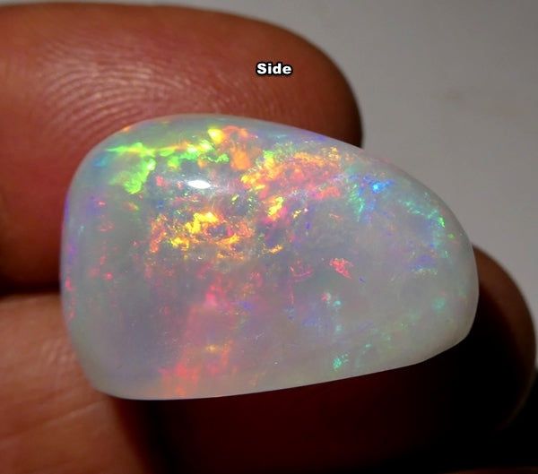 23.45CT UNTREATED RAINBOW FLASHING HUGE 100% NATURAL CRYSTAL OPAL