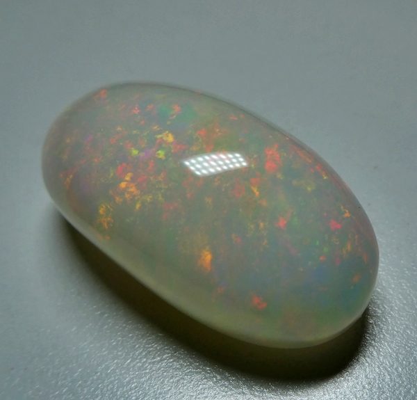 65.65CT UNTREATED JUMBO RAINBOW FLASHING 100% NATURAL CRYSTAL OPAL