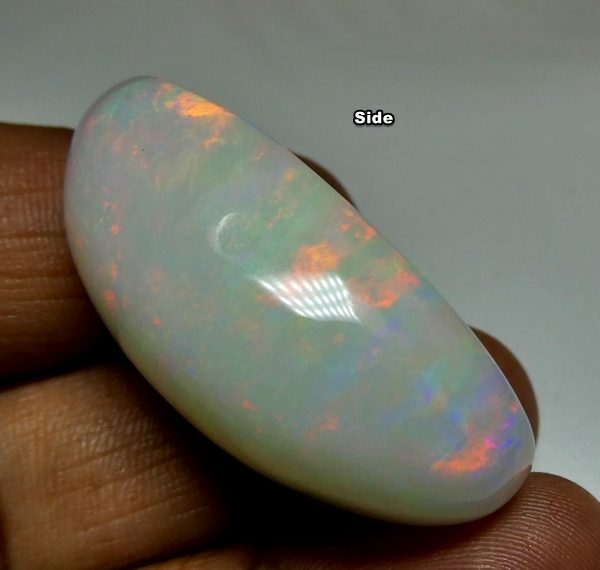 65.65CT UNTREATED JUMBO RAINBOW FLASHING 100% NATURAL CRYSTAL OPAL