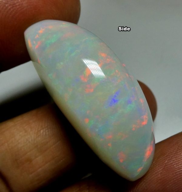 65.65CT UNTREATED JUMBO RAINBOW FLASHING 100% NATURAL CRYSTAL OPAL