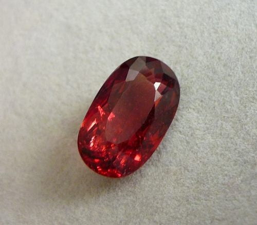 8.24CT DAZZLING ORANGE RED HESSONITE